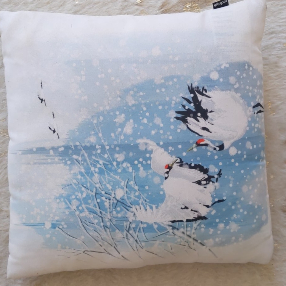 Society6 blue and white snowy cranes throw pillow